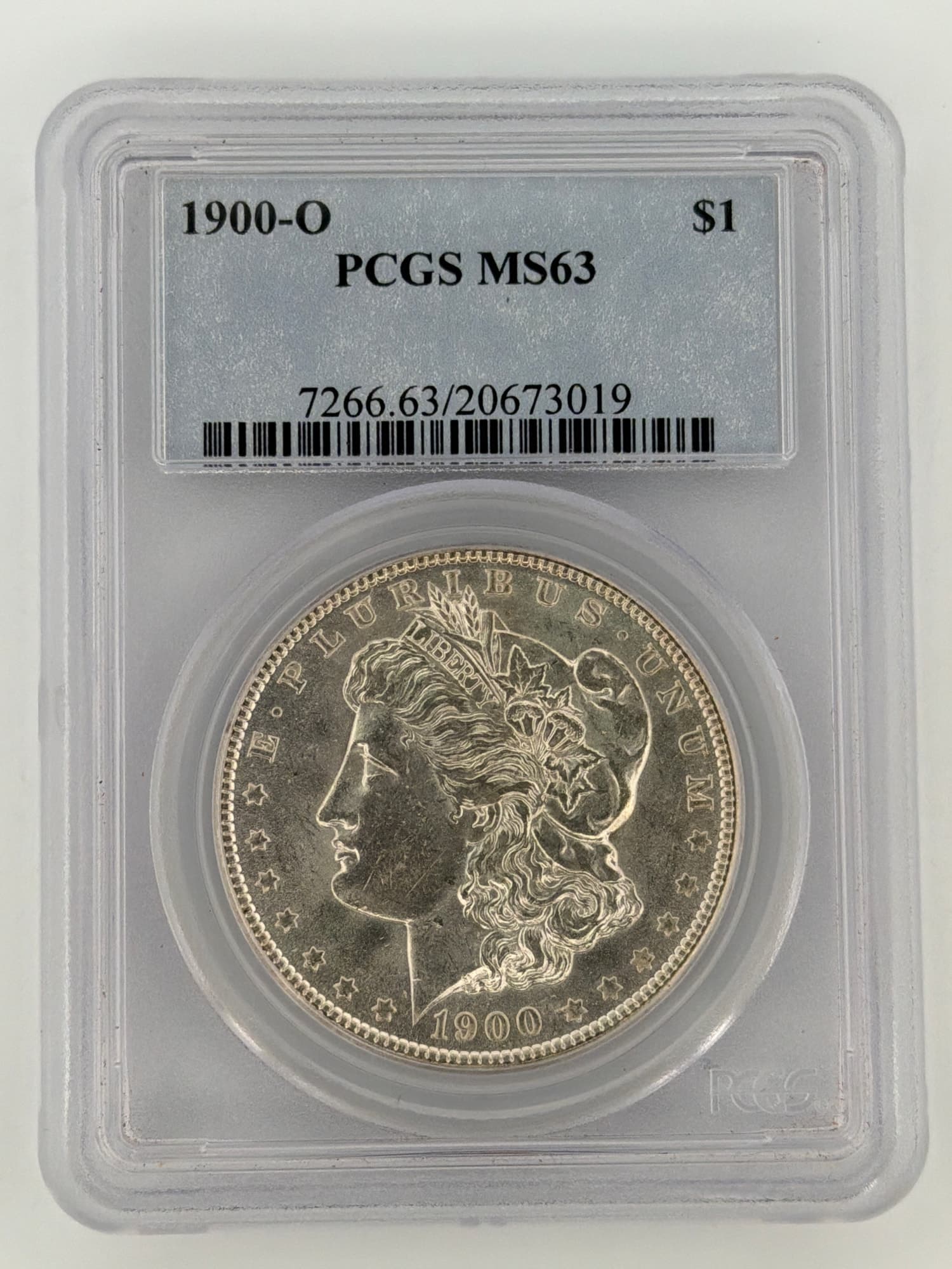 1900-O Morgan Silver Dollar PCGS MS63 obverse showing Liberty portrait with O mint year 1900 in PCGS slab