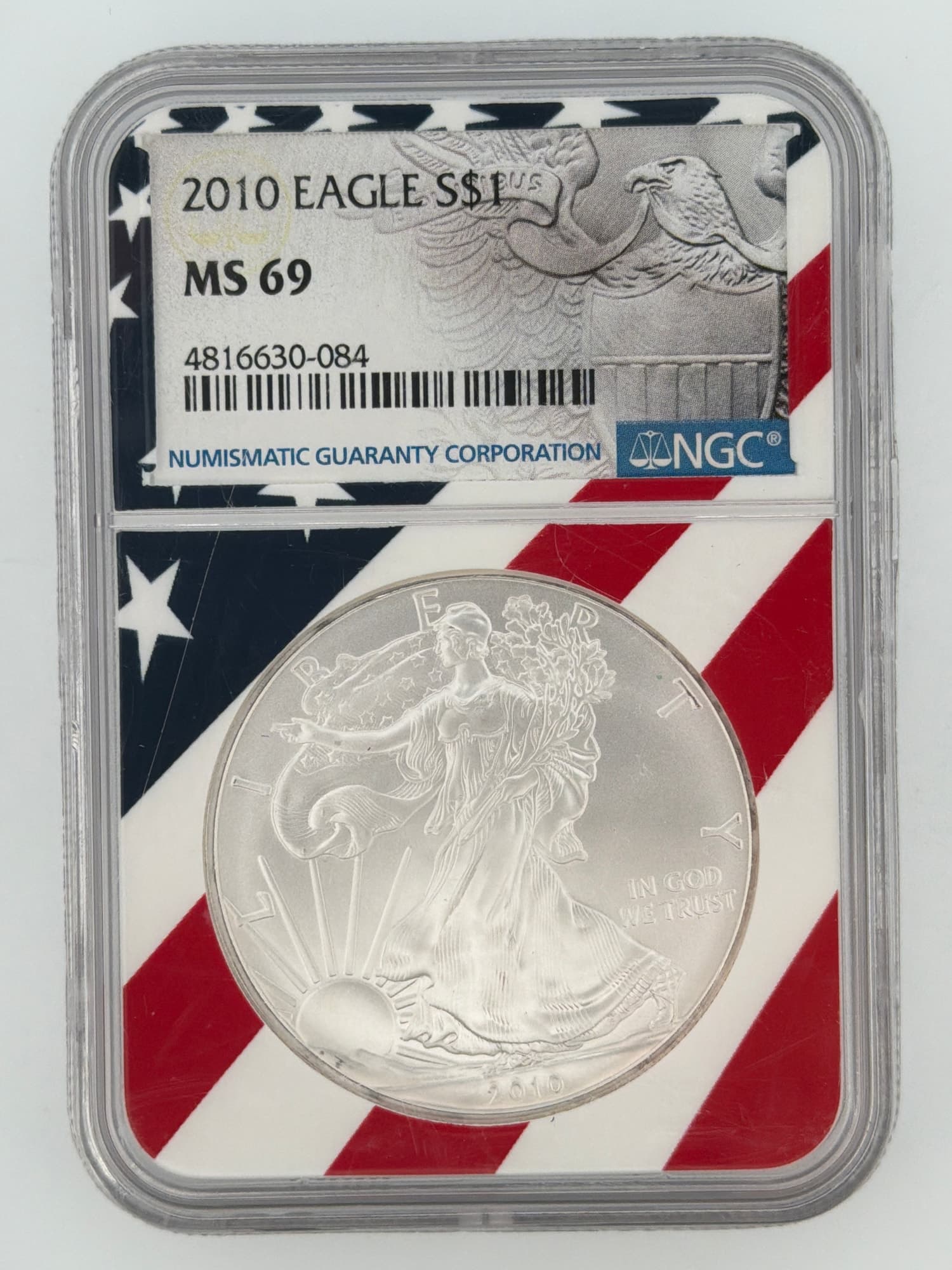 2010 American Silver Eagle NGC MS 69 obverse in patriotic flag-themed NGC slab showing Walking Liberty design