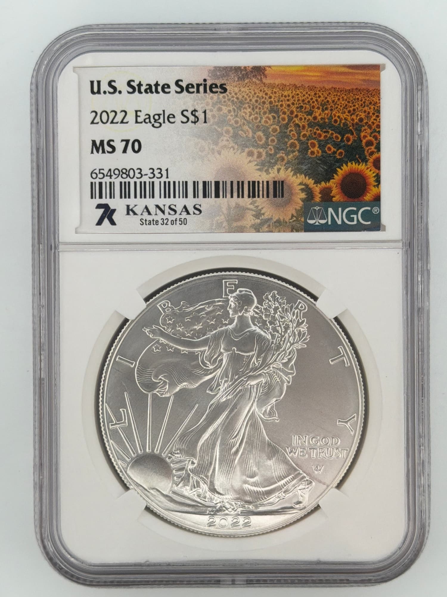 2022 American Silver Eagle NGC MS70 obverse in Kansas State Series slab showing Walking Liberty design and sunflower label art