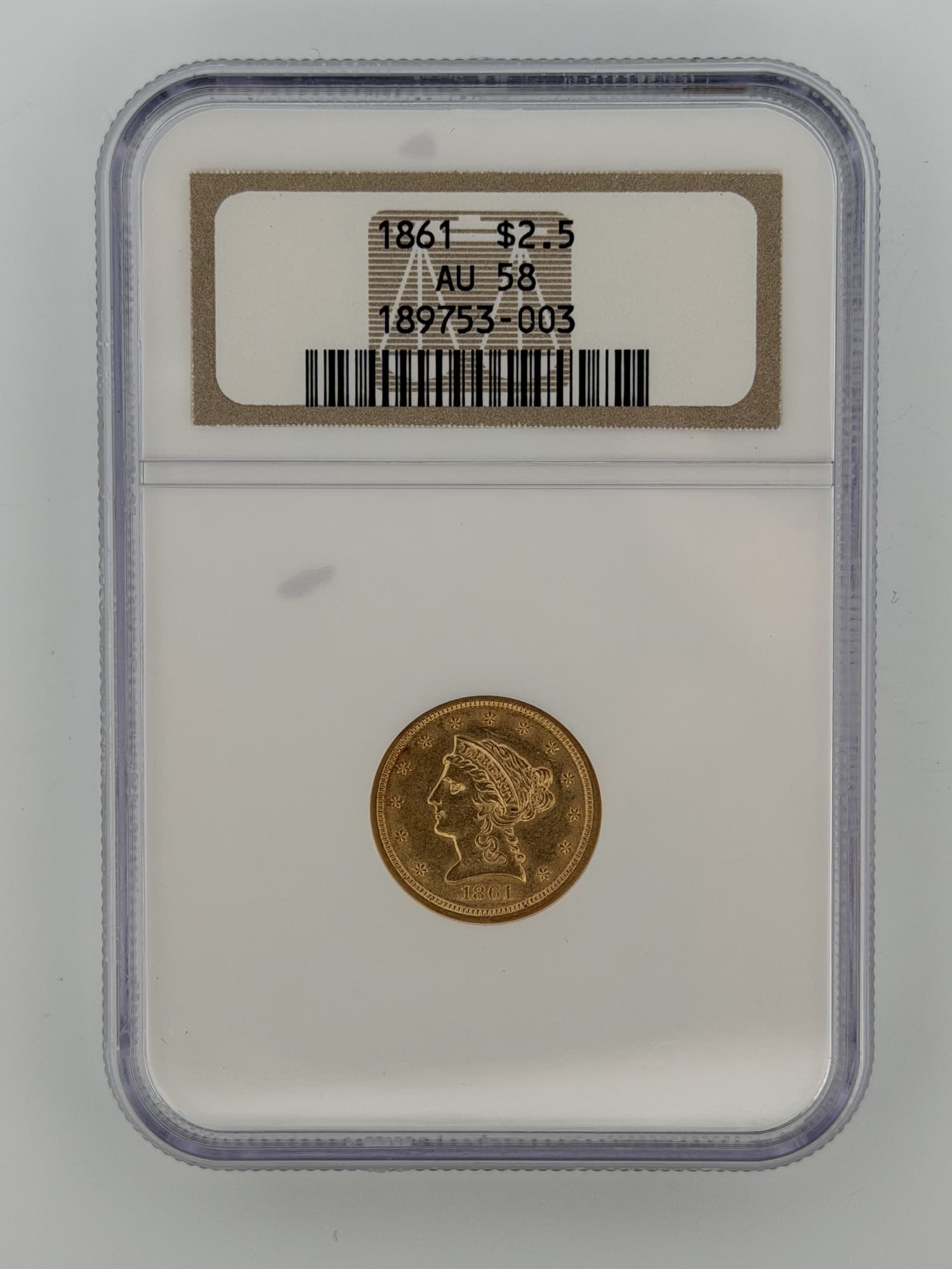 1861 Liberty Head Quarter Eagle $2.50 gold coin obverse in NGC AU58 slab with label showing certification number 189753-003