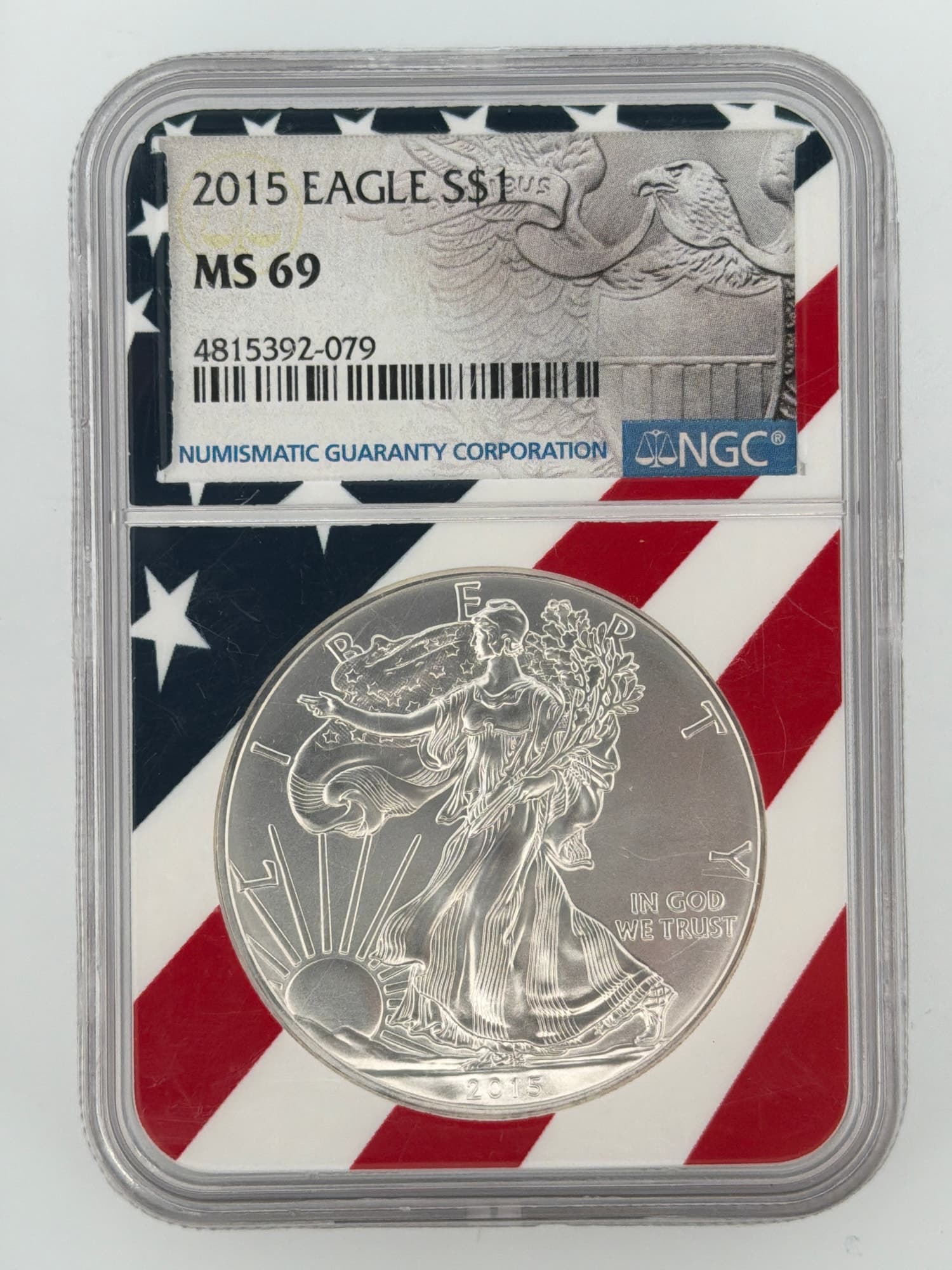 2015 American Silver Eagle NGC MS69 obverse showing Walking Liberty design in patriotic NGC flag slab
