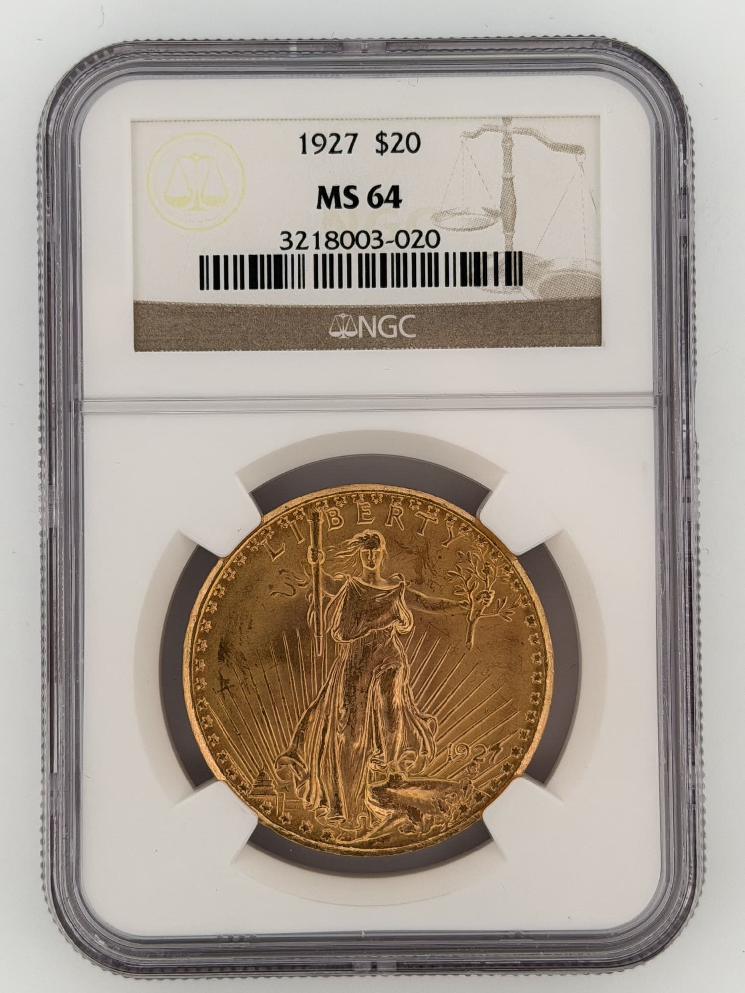 1927 Saint-Gaudens Double Eagle $20 Gold NGC MS64 obverse showing striding Liberty with torch and olive branch in NGC slab